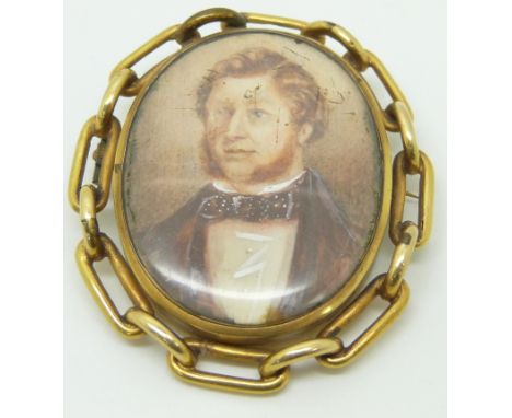 Victorian swivel mourning brooch set with a portrait miniature, verso set with hair, 5.4 x 6.2cm
