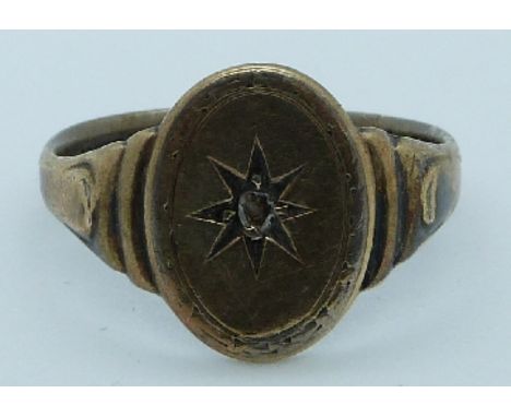 A silver signet ring set with a rose cut diamond, 4.5g, size S/T