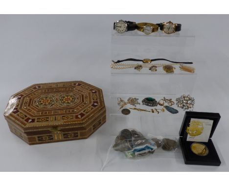 A collection of jewellery and watches including Roamer, Bonheur, a cameo, vintage brooches, coins including silver examples e