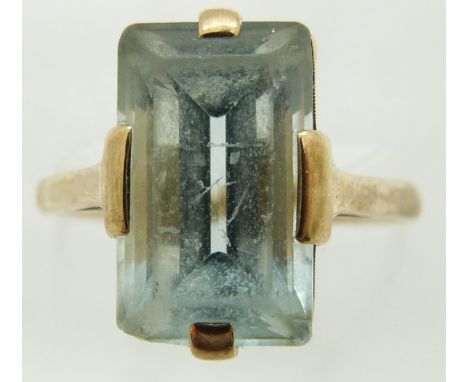 A yellow metal ring set with paste, 3.9g, size O/P