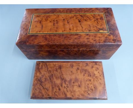 An inlaid Amboyna humidor with lift out tray, width 40cm, and a backgammon set