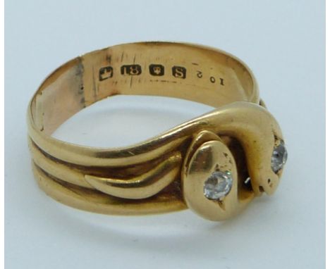 An 18ct gold serpent ring set with two diamonds, London 1893, 5.9g, size S/T