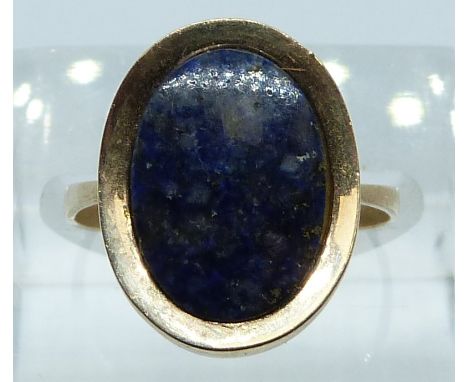 A 9ct gold ring set with a sodalite cabochon, 2.8g, size L