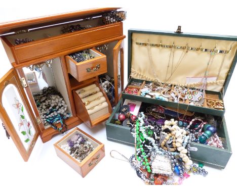 A collection of costume jewellery including beads, vintage brooches etc