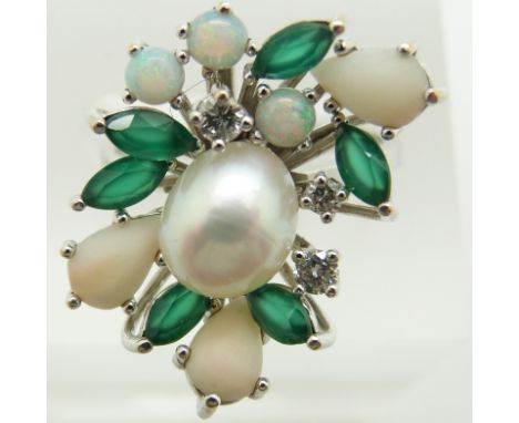 An 18ct white gold ring set with a pearl, marquise cut chrysoprase, round opal cabochons, pear cut coral cabochons and three 