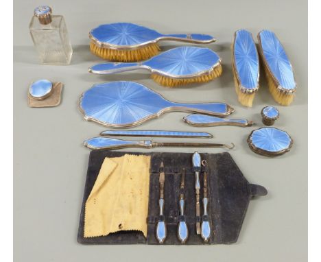 Art Deco Mappin &amp; Webb hallmarked silver and blue guilloché enamel dressing table and manicure set comprising hand mirror