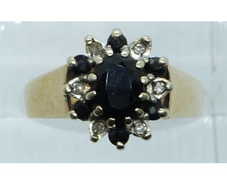 A 9ct gold ring set with sapphires and diamonds, 4.8g, size O/P&nbsp;