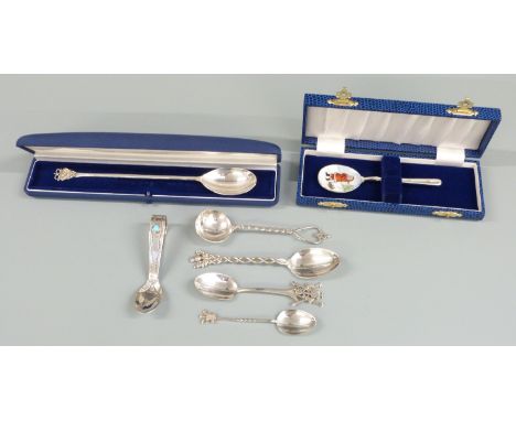 Two cased hallmarked silver spoons, one with enamel Christmas decoration to bowl together with further hallmarked silver spoo