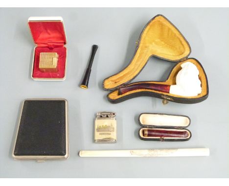 Cased Meerschaum pipe with carved bust decoration, cased cherry amber and 9ct gold cheroot holder, Ippag 'Dice' cigarette lig