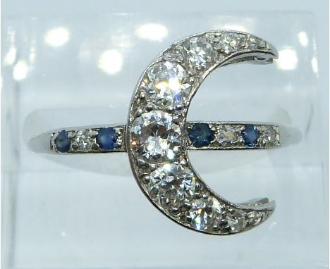 Victorian white metal ring in the form of a crescent set with diamonds, the largest approximately 0.25ct and sapphires, 4.3g,