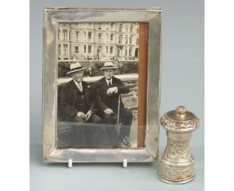 Hallmarked silver photograph frame to suit 6 x 4 inch photo together with a hallmarked silver mounted pepper grinder