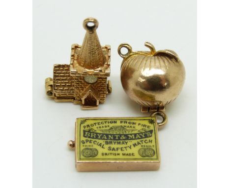 A 15ct gold charm in the form of a matchbox set with enamel (3.9g), 9ct gold charm in the form of an apple opening to reveal 