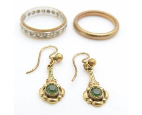 A 9ct gold eternity ring, a 9ct gold wedding band/ ring and a pair of 9ct gold earrings, 6.5g