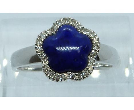 A 9ct white gold ring set with lapis lazuli and diamonds, 2.9g, size P/Q