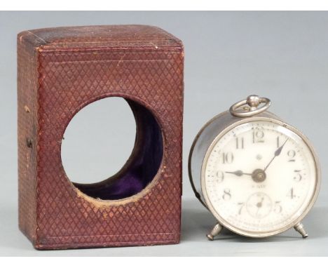 Ansonia c1900 8-day travel clock in silvered drum style case, the enamel Arabic 5.5cm&nbsp;dial with secondary seconds, conta