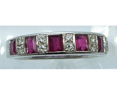 An 18ct white gold ring set with square/ rectangular cut rubies and diamonds, 4.6g, size L