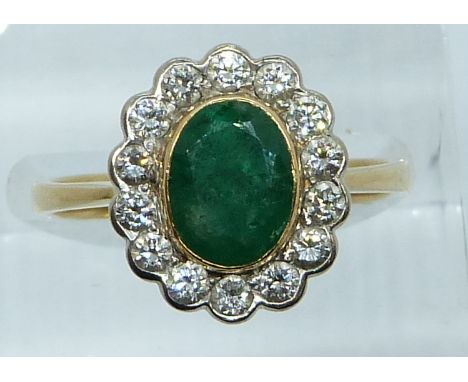 An 18ct gold ring set with an emerald and diamonds, 4g, size N/O&nbsp;