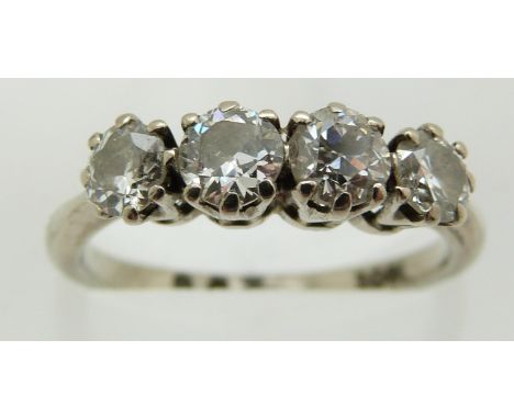 An 18ct white gold ring set with four diamonds, each approximately 0.25ct, 3.5g, size M