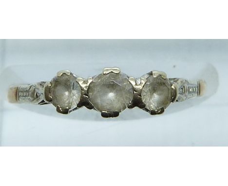 A 9ct gold ring set with synthetic white sapphires, 1.9g, size K/L