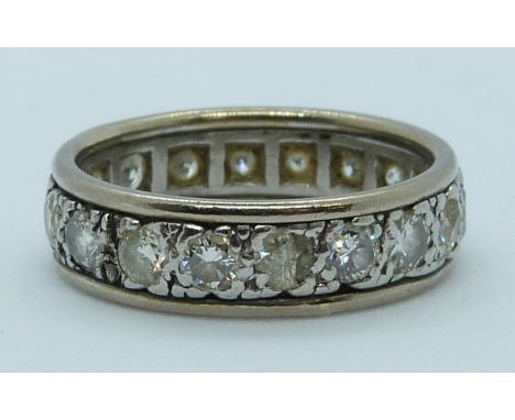 An 18ct white gold eternity ring set with diamonds, each approximately 0.1ct, total weight approximately 1.6ct, 5.6g, size L