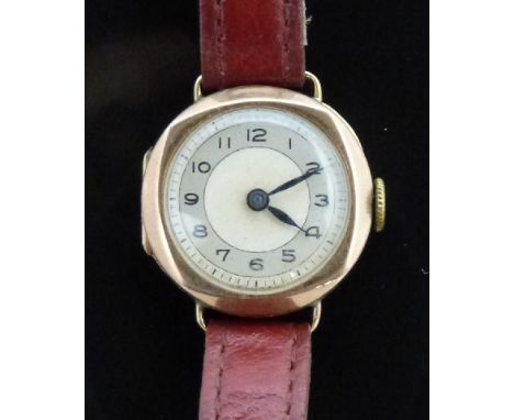 Vintage 9ct gold ladies wristwatch with blued hands, black Arabic numerals and silver dial, on red leather strap, case diamet