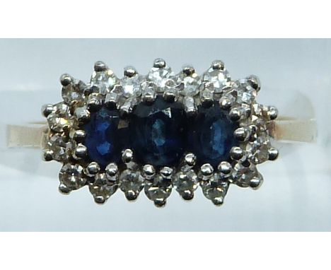 A 9ct gold ring set with sapphires and diamonds, 2.3g, size K