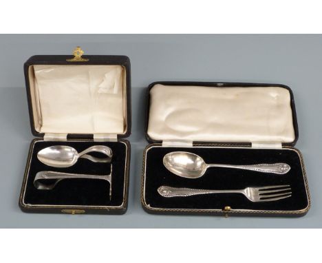 Cased hallmarked silver fork and spoon set together with a cased hallmarked silver baby's spoon and&nbsp; pusher, weight of a