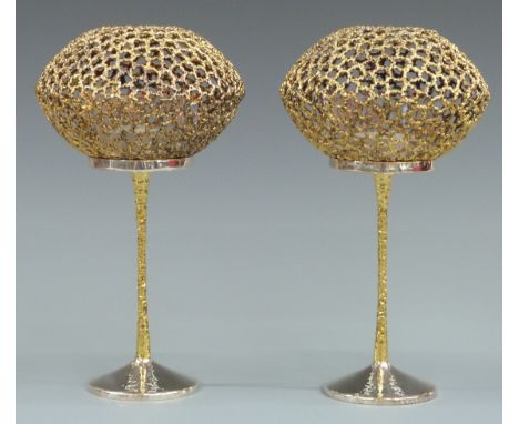 Pair of Stuart Devlin hallmarked silver pedestal tea light holders with pierced and gilt bowls supported on textured and gilt