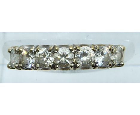 A 9ct gold ring set with cubic zirconia, 1.8g, size J