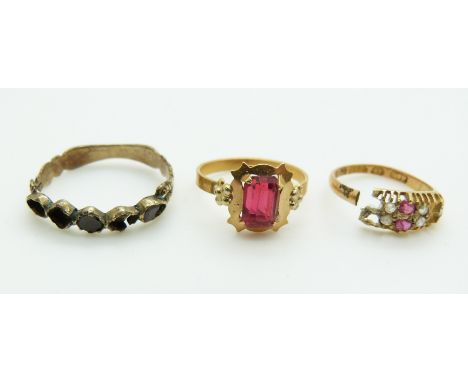 An 18ct gold ring (1.5g), a 15ct gold ring (1.1g) and a Victorian ring