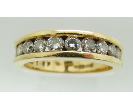 An 18ct gold half eternity ring set with twelve round brilliant cut diamonds, approximately 1ct total diamond weight, 5.2g, s