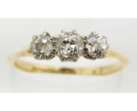 An 18ct gold ring set with three diamonds in Maurice Moses Diamond Merchants, Oxford Street vintage jewellery box, 2.2g, size