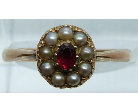 Victorian ring set with a ruby surrounded by seed pearls, 2.5g, size L