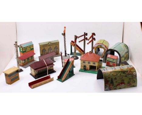 A large box containing approx. 30 tinplate buildings by Mettoy, KBN, Brimtoy; JeP; Chad Valley; and some un-identified. Inclu