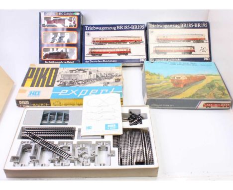 Collection of HO scale Piko and Russian train sets and accessory sets to include Piko 0726 Diesel Locomotive and wagon set, i