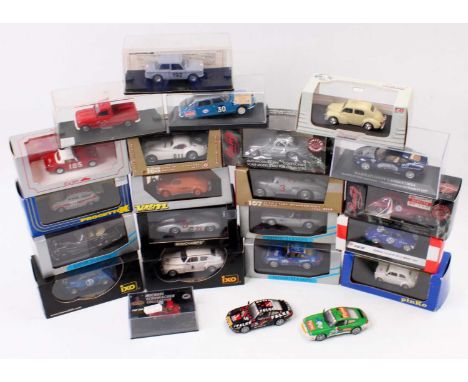 Two trays containing a quantity of 1/43rd scale diecast, with specific examples including a Minichamps Porsche 911 Supercup 1