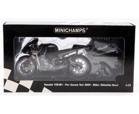 A Minichamps 1/12 scale Motorcycle No. 122 043946 Yamaha YZR-M1 pre-season test 2004 "Valentino Rossi" in its original box