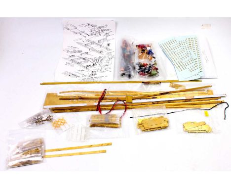 Brass parts to make the underframe but not body or bogies for a LMS Suburban coach. Quantity of LMS letter and number transfe