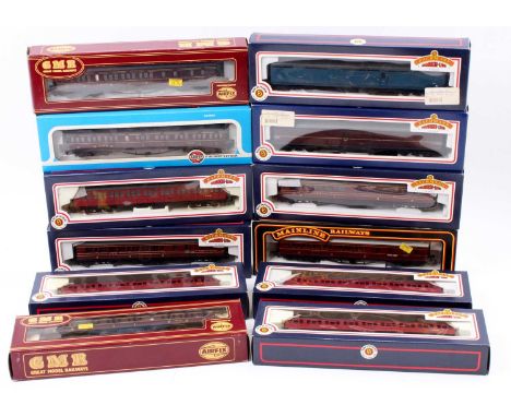 12 boxed Bachmann, Airfix, Mainline and similar 00 gauge passenger stock items, mixed regions and liveries to include a GMR R
