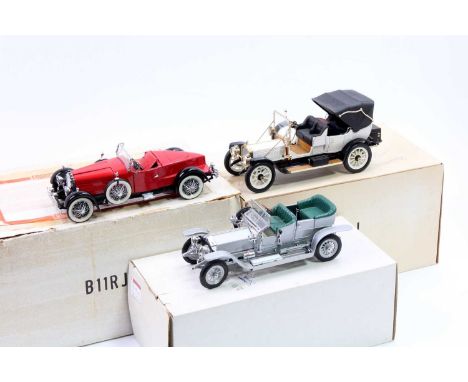 A group of 3 Franklin Mint boxed 1/24th scale diecast models as follows, a 1912 Packard Victoria, a Rolls Royce Silver Ghost,