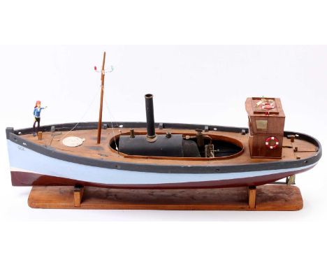 A scratch built spirit fired live steam launch, comprising of stained and hand-painted wooden hull with removable superstruct