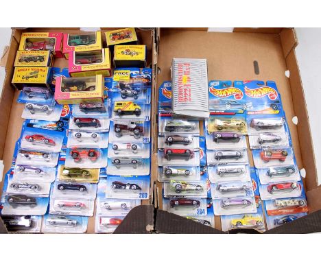 Two trays containing a quantity of various mixed Matchbox models of Yesteryear, Hotwheels Modern Release diecast and other as