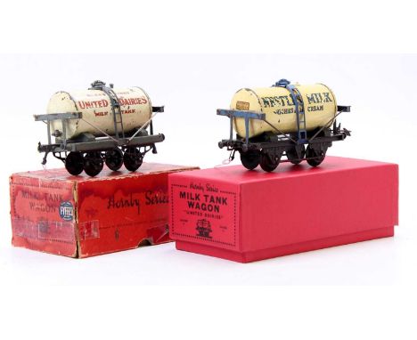 Two Hornby Milk tank wagons: 1929-30 United Dairies, grey/blue open axleguard base, white tank, missing one filler – which is