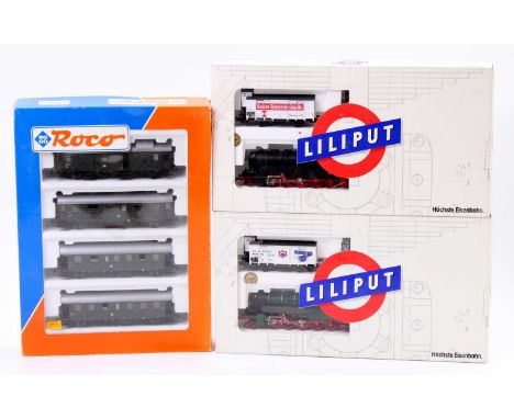 A collection of Liliput and Roco boxed train sets and coach packs, to include a Liliput No. 896 German BR Class 95 2-10-2 loc