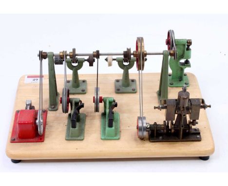 A well-made stationary steam workshop comprising of twin cylinder vertical steam engine, with oscillating cylinders and nicel