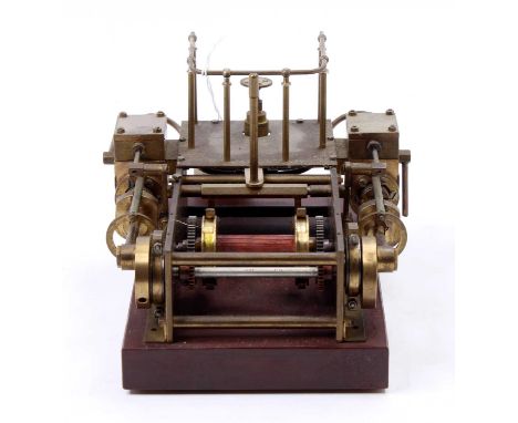 A well-engineered twin cylinder winch winding engine, comprising of twin cylinders with central steam inlet point, with manua