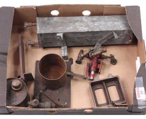 A collection of various steam components to include a water pump, flash boiler, spare grate, oil can and other various compon