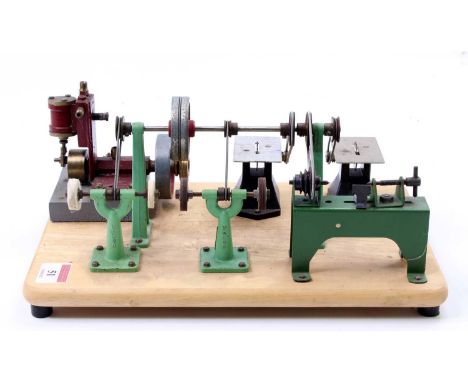 A well-made stationary steam-powered model workshop, comprising of single oscillating cylinder vertical engine with cast in e