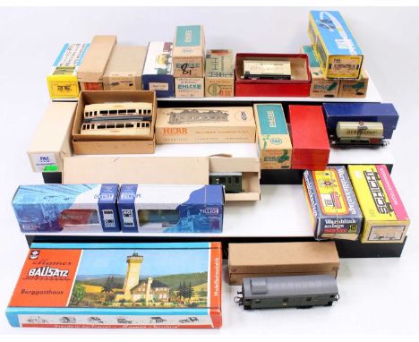 One box containing a collection of mixed H0 scale continental outline passenger stock and rolling stock to include Piko, Baus