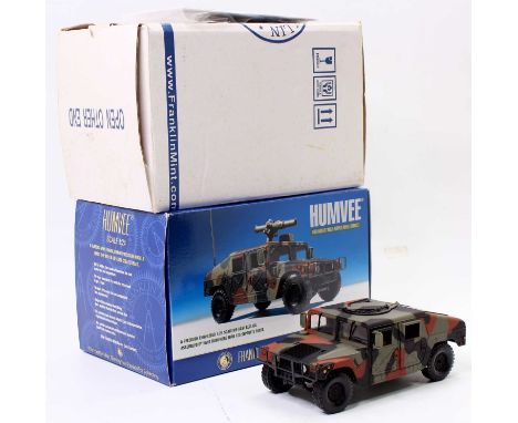 A Franklin Mint 1/24th scale Humvee M966 in military camouflage, as issued in its original packaging with paperwork (VGNM-BNM